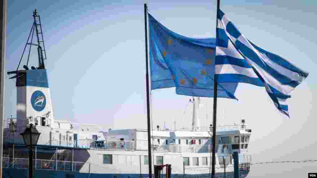 At the water’s edge on Chios port. Fractured relations from EU down to the Greek government and the local authorities on Chios have exacerbated the issues. (J. Owens for VOA)