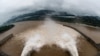 The Three Gorges Dam on the Yangtze River discharges water to lower the water level in the reservoir following heavy rainfall and floods in a few regions, in Yichang, Hubei province, China July 17, 2020. The picture was taken on July 17, 2020. (China Daily via Reuters)
