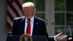 Le président Donald Trump annonçant le retrait des Etats-Unis de l'accord de Paris sur le climat, la Maison Blanche, Washington, 1er juin 2017. (AP Photo/Pablo Martinez Monsivais)