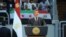 In this handout picture Egyptian President Mohammed Morsi gives a speech to thousands of Islamists and Syrian opposition supporters during the "support for Syria" rally at Cairo stadium, June 15, 2013 in Cairo, Egypt. (Credit: Ho/Egyptian Presidency)