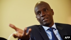 FILE - President Jovenel Moise, then the Haitian presidential candidate of PHTK Political Party, speaks during an interview with AFP in Port-au-Prince, Sept. 6, 2016.