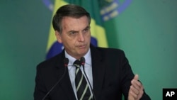Brazil's President Jair Bolsonaro speaks during a ceremony at Planalto presidential palace in Brasilia, Brazil, Jan. 15, 2019. 