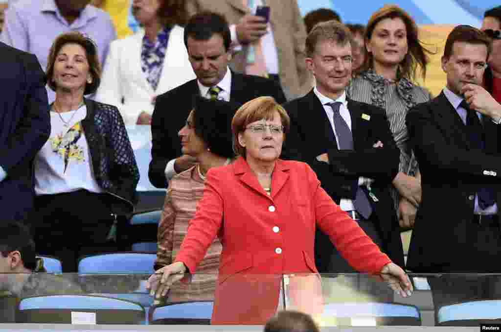 German Changellor Angela Merkel attends the 2014 World Cup final between Germany and Argentina at the Maracana stadium in Rio de Janeiro, July 13, 2014.