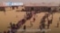 VOA60 Africa - Nigeria: Thousands of refugees return from Chad