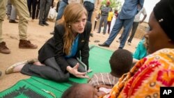 US Ambassador to the United Nations Samantha Power meets with a woman and her children who fled to Mokolo, Cameroon, April 18, 2016, to escape Boko Haram.