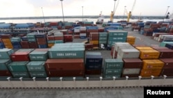 Asia World port terminal seen in Yangon December 8, 2015. The United States is temporarily easing trade restrictions on Myanmar by allowing all shipments to go through its ports and airports.