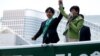 FILE : Tokyo Governor and head of Tokyo Citizens First party Yuriko Koike (R) delivers a speech to voters atop of a campaign van as election campaign officially kicks off for Tokyo Metropolitan Assembly election, on the street in Tokyo, June 23, 2017. 