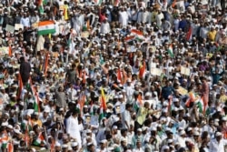 Indians participate in a protest against a new citizenship law that opponents say threatens India's secular identity in Bangalore, India, Jan. 3, 2020.
