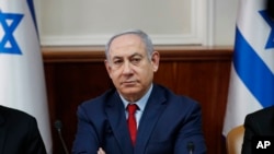 Israeli Prime Minister Benjamin Netanyahu chairs a weekly cabinet meeting in Jerusalem, Jan. 5, 2020. 