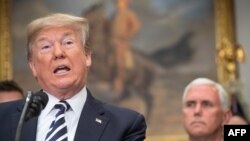 US President Donald Trump spoke about his decision to cancel the meeting with Kim Jong Un on June 12 in Singapore before signing the Economic Growth, Regulatory Relief, and Consumer Protection Act in the Roosevelt Room at the White House in Washington, DC, on May 24, 2018.