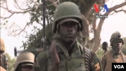 ទាហាន​​នៅ​ប្រទេស​ Rwanda​ នៅ​ពេល​​ប្រទេសនេះ​​មាន​​អំពើ​​ប្រល័យ​​ពូជសាសន៍។​​ 