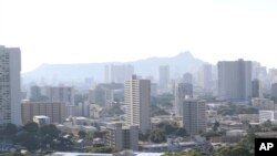 អគារ Diamond Head អគារ​ខ្ពស់​ៗ​ផ្សេងទៀត​នៅ​ក្នុង​ទីក្រុង​ Honolulu កាលពី​ថ្ងៃសៅរ៍​ទី​១៣ មករា ២០១៨។