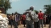 A Central African Republic man receives food at a food distribution site in Makunzi Wali in northern C.A.R. (Photo: Zack Baddorf for VOA) 