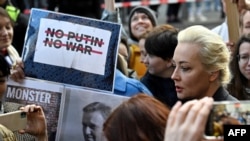 FILE - Yulia Navalnaya, widow of the late Kremlin critic Alexey Navalny, attends a rally near the Russian embassy in Berlin. March 17, 2024. Accusing Navalnaya of participating in the activities of an "extremist" group, a Russian court on July 9 ordered her arrest in absentia.