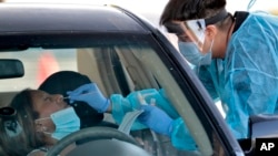 Dnevni broj novoobolelih od Kovida 19 u Sjedinjenim Državama, sedmi dan zaredom, najveći je do sada zabeleženi u čitavoj zemlji. (Foto: AP Photo/Matt York)