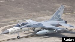 FILE - An F-CK-1 Ching-kuo Indigenous Defense Fighter is seen at an air force base in Tainan, Taiwan, Jan. 26, 2021. 