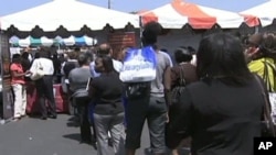 FILE - African-Americans are still twice as likely as whites to be unemployed, according to the 2016 State of Black America Report.