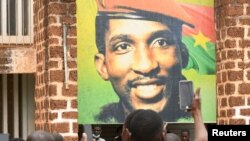 Supporters of the late president Thomas Sankara gather at the his memorial site in Ouagadougou