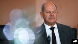 German Chancellor Olaf Scholz arrives for a Cabinet meeting at the chancellery in Berlin, Sept. 18, 2024.