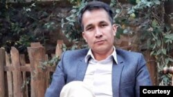 Afghan journalist Alireza Ahmadi, killed in the Aug. 26, 2021, Kabul airport blast while trying to evacuate to Italy, is seen in an undated photo at an unidentified location. (Courtesy - Mustafa Ahmadi)