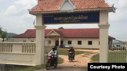 Villagers riding motorcycles are seen leaving Sre Ambel district office on March 26, 2018, after appealing to the district governor about the status of their ongoing land disputes between villagers and sugarcane companies, Koh Kong province, Cambodia. (Photo provided by local rights Adhoc in Koh Kong province) 