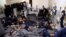 FILE - Foreign prisoners, suspected of being part of the Islamic State, lie in a prison cell in Hasaka, Syria, January 7, 2020.