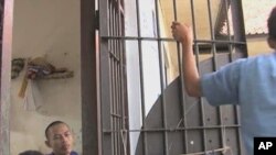 Inmates at Tangerang prison in Jakarta leave their cells to participate in conflict resolution training