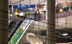 Two soldiers are seen inside Terminal 21 Korat mall in Nakhon Ratchasima, Thailand, Feb. 9, 2020. A soldier who holed up in the popular shopping mall shot multiple people on Saturday.