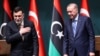 Turkish President Recep Tayyip Erdogan, right, and Libyan Prime Minister Fayez al-Sarraj hold a joint press conference at the Presidential Complex in Ankara on June 4, 2020.
