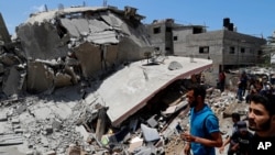 ისრაელის დაბომბვაში მოყოლილი საცხოვრებელი შენობა ღაზის სექტორში. 12 მაისის ფოტო. 