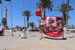 In Tripoli's Martyr's Square, anti-Haftar banners still fly as it nears the end of three months of fighting for the city, July 1, 2019. (H.Murdock/VOA)