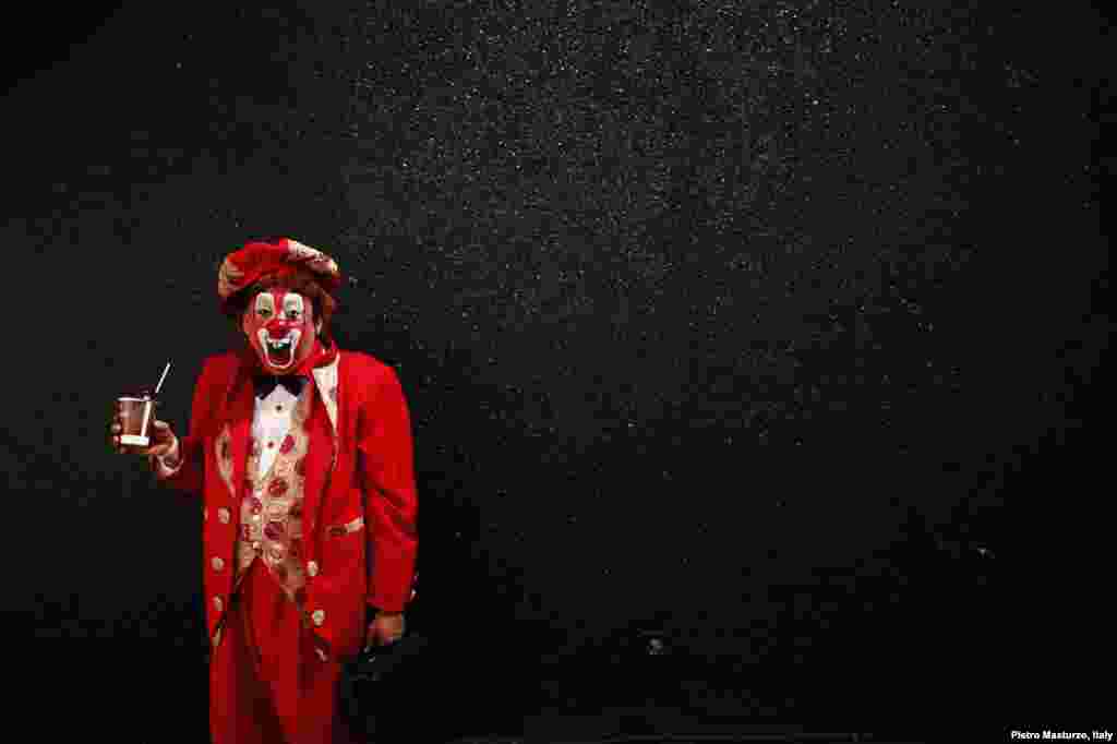"Resortito", a clown, rallies for peace during the 18th Latin American clown convention or "Fair of Laughter" in Mexico City, Mexico, Oct. 23, 2013. 