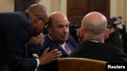 U.S. Ambassador to the European Union Gordon Sondland sits with his lawyer Robert Luskin while testifying at a House Intelligence Committee hearing as part of the impeachment inquiry into U.S. President Donald Trump on Capitol Hill, Nov. 20, 2019.