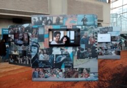 FILE - Advertising for the U.S. Census Bureau's outreach campaign for the 2020 Census is displayed at the Arena Stage in Washington, Jan. 14, 2020.