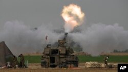 د اسرائیل توپخانې د غزې تړانګه تر برید لاندې نیولې. 