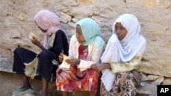 Ethiopian young girls waiting to travel to Yemen in Bossaso, the commercial city of the semi-autonomous region of Puntland and the launching pad of the people trying to cross the Gulf of Aden to Yemen. 