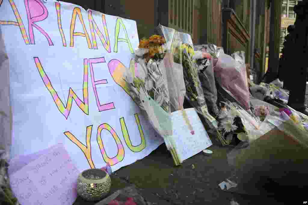 Flower tributes are placed at St Ann&#39;s square, Manchester, England, May 23, 2017.