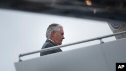 FILE - U.S. Secretary of State Rex Tillerson boards his plane at Cologne Bonn Airport, Germany, as he leaves after a meeting of foreign ministers of the G-20 leading and developing economies, Feb. 17, 2017. On Wednesday, Tillerson and U.S. Homeland Security Secretary John Kelly will visit Mexico.