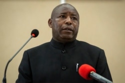 Burundi's president-elect Evariste Ndayishimiye speaks to the media after signing the book of condolences at the presidential palace in Bujumbura, Burundi, June 13, 2020.