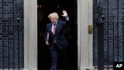 Britain's Prime Minister Boris Johnson leaves 10 Downing Street to attend the weekly session of PMQs in Parliament in London, June 10, 2020.