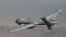 FILE - A U.S. Reaper drone patrols the skies in southern Afghanistan near the frontier with Pakistan.
