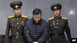 Hyeon Soo Lim, the pastor of the Light Korean Presbyterian Church in Toronto, Canada, is brought to court in Pyongyang, North Korea, Wednesday, Dec. 16, 2015. North Korea's Supreme Court sentenced him to life in prison with hard labor.