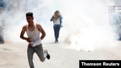 Israeli soldier killed by rock thrown during West Bank raid.