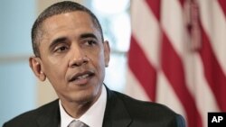 President Barack Obama speaks to members of the media during a Cabinet meeting at the White House, Aug. 3, 2011
