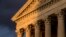 FILE - In this Oct. 10, 2017, file photo, the U.S. Supreme Court in Washington is seen at sunset. 