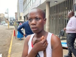 Soft drink vendor Runyararo Mazinyira, 24, says she sustained injures from the police assaults in Harare, Nov. 20, 2019. (Columbus Mavhunga/VOA)