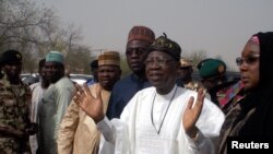 FILE - Information Minister Lai Mohammed speaks during his visit to the school in Dapchi in the northeastern state of Yobe, where dozens of school girls went missing after an attack on the village by Boko Haram, Nigeria, Feb. 22, 2018. 