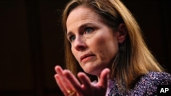 Supreme Court nominee Amy Coney Barrett testifies during the third day of her confirmation hearings before the Senate Judiciary Committee on Capitol Hill in Washington, Oct. 14, 2020.