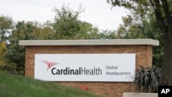 FILE - A sign is displayed at the Cardinal Health, Inc. corporate office in Dublin, Ohio, Oct. 16, 2019. Negotiations aimed at reaching a major settlement in the nation's opioid litigation reached an impasse Friday, Oct. 18.