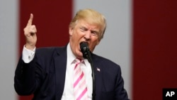 FILE - President Donald Trump speaks at a campaign rally in support of Sen. Luther Strange, Friday, Sept. 22, 2017, in Huntsville, Alabama.